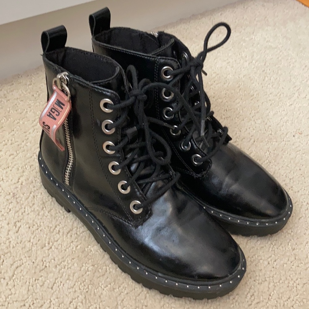 Studded black boots